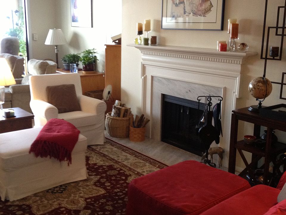 wood burning fireplace in living room
