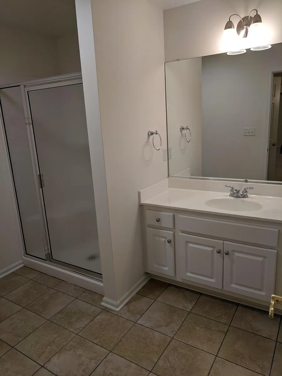 First Floor Bedroom -- Full Bathroom - 129 Burnet St