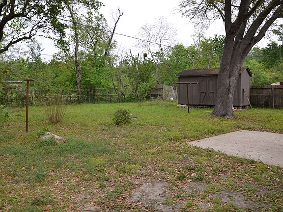 Back yard. Large storage shed. 