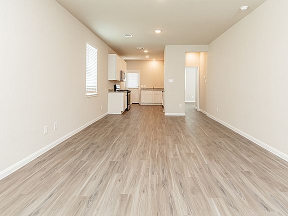 Family Room to Dining Area and Kitchen