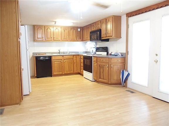 Spacious Kitchen with plenty of cabinets and lots of space for your open concept dining room. All ap