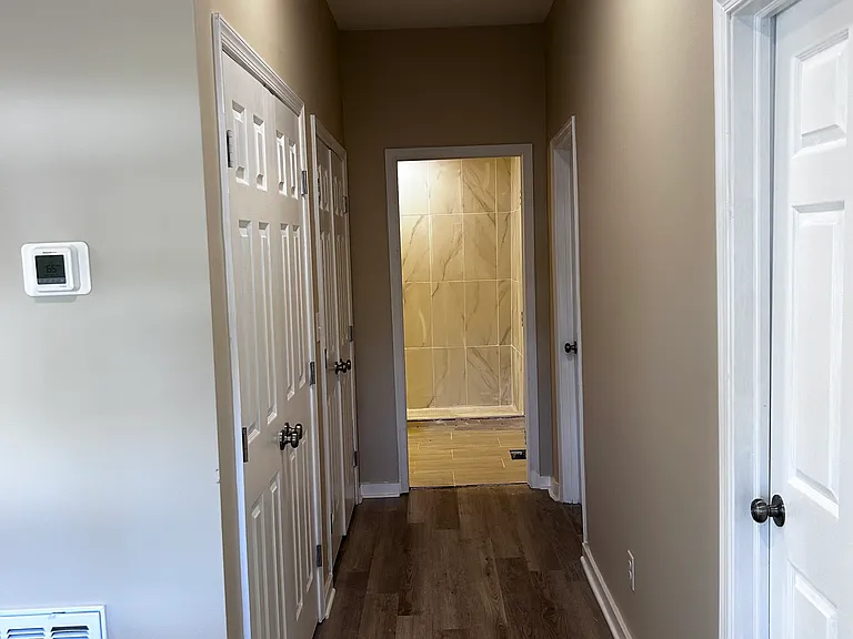 Hallway to bedrooms, laundry & bathroom