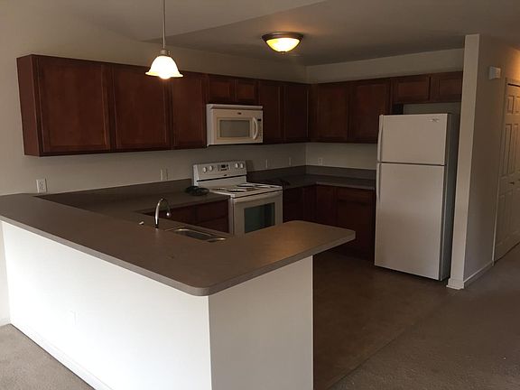 Large open kitchen with breakfast bar