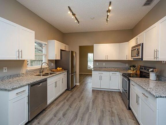 5th image of 1305 Rain Forest Ln