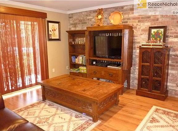 Living room with exposed brick wall