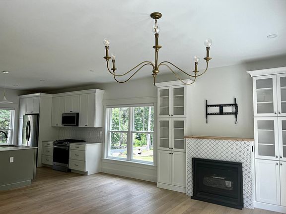 Living, dining to kitchen view