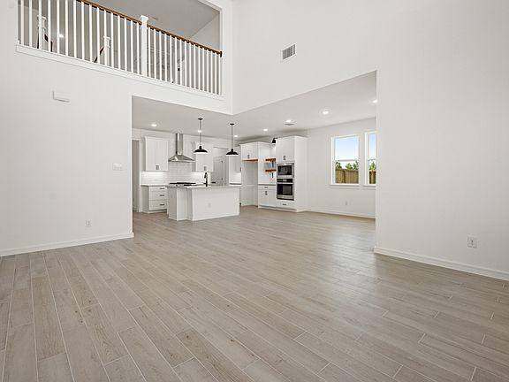 Great room with volume ceiling