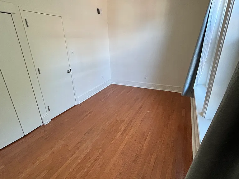Large, spacious bedroom easily accommodates a king-size bed plus desk