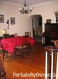 Dining room main unit
						:
						original hardwood floors