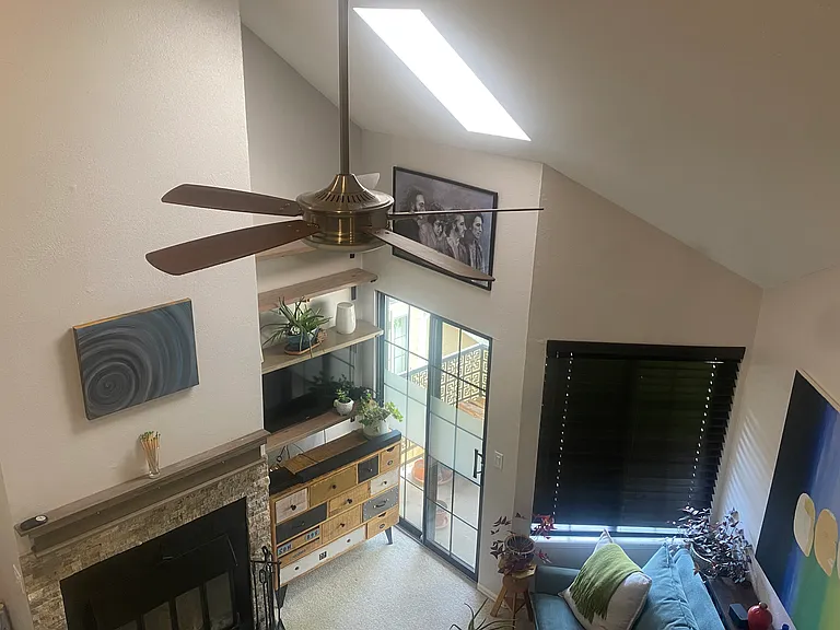 View of living room from upstairs loft.