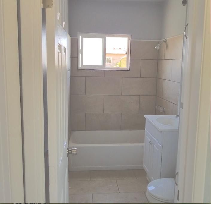 Remodeled Bathroom (New tub, shower, window, vanity and acce