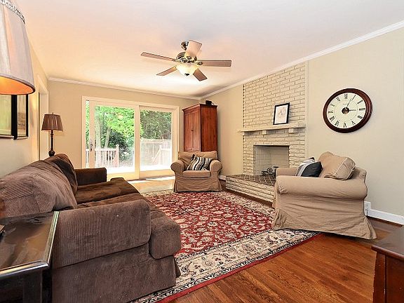 Living Room with Wood Burning Fireplace