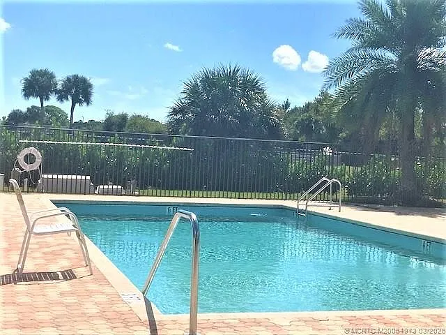 3486 SW Pindo Palm Ln — Photo 38