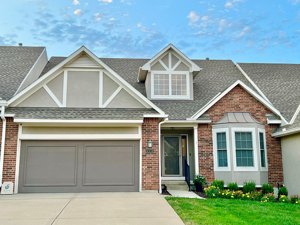 Front of townhouse with two car garage