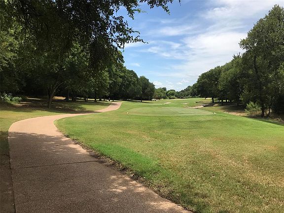 Image 3: View of golf course from this lot.