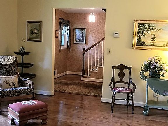Living room with view of foyer