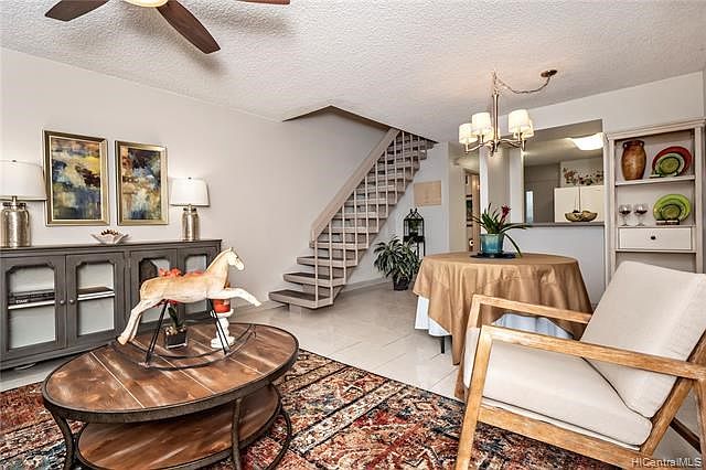 Good space for living and dining, plus a kitchen pass-thru.