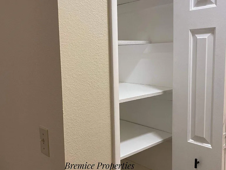 Linin Closet in the Main Bedroom