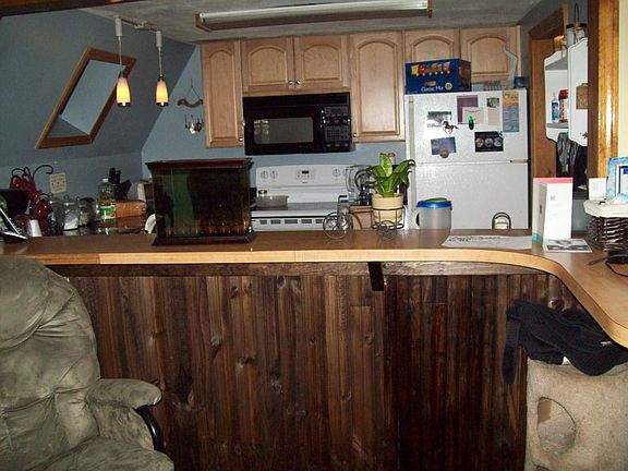 Kitchen with a bar