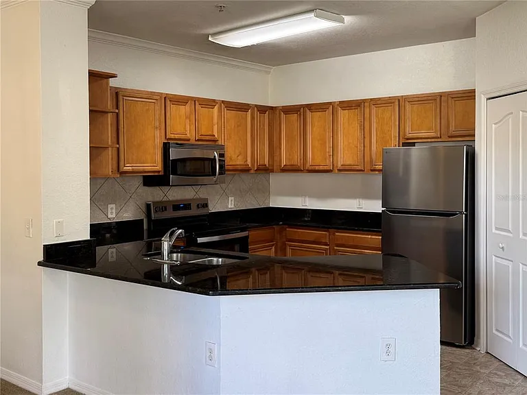 6121 Metrowest Blvd #101 — Photo 8