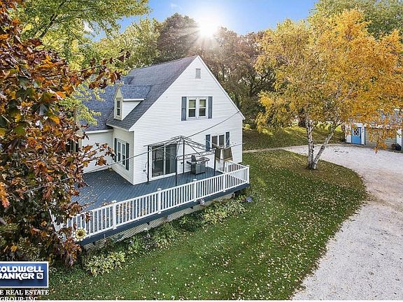 Side view of home w/deck