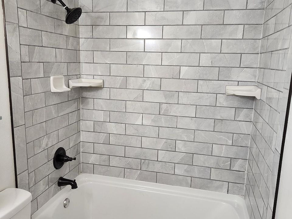 Bathtub and surround