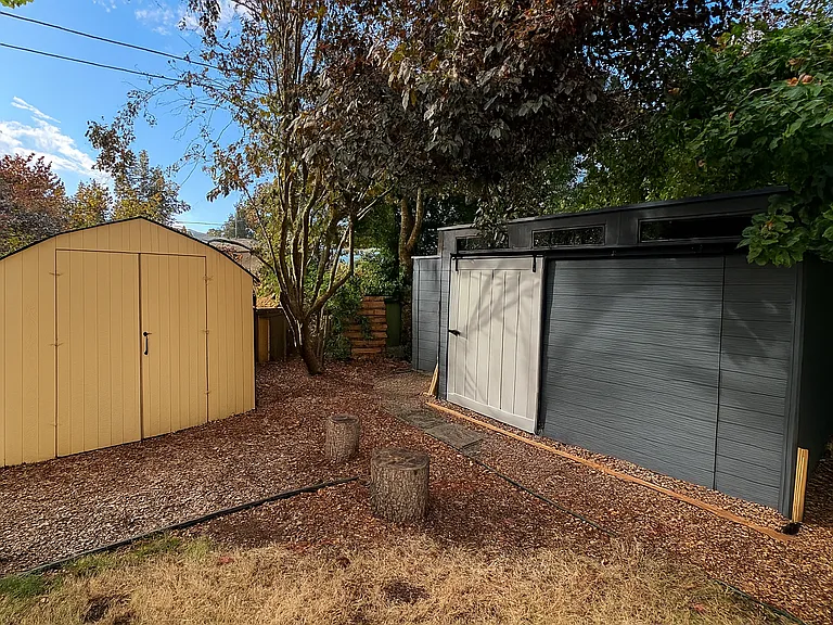 Three spacious sheds for extra yard storage.