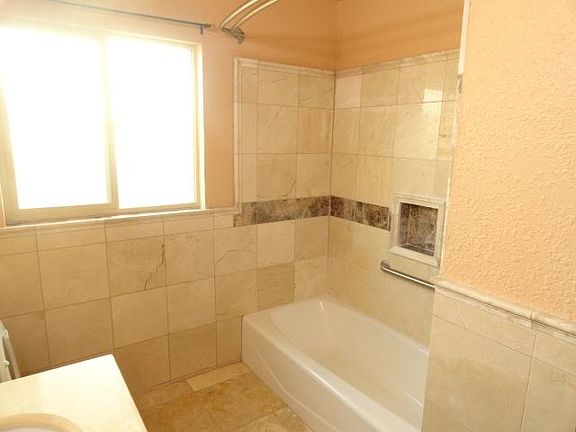 Marble surrounding the tub/shower