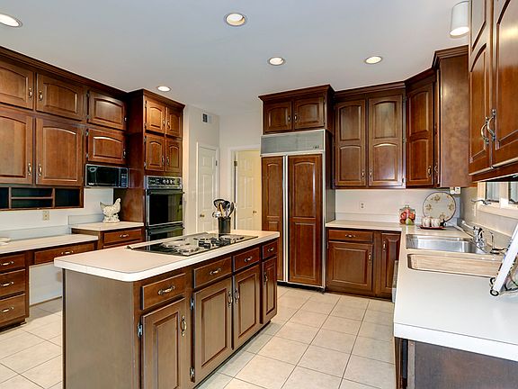 Kitchen with Cherry Wood Cabinets