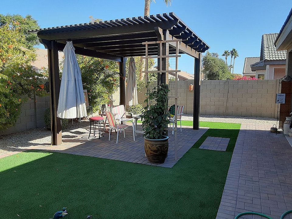 Pergola, turf and pavers