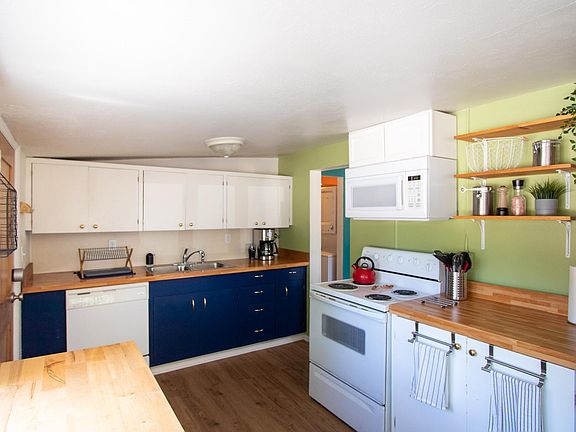 Plenty of kitchen storage space. Includes dishwasher, oven, & microwave.