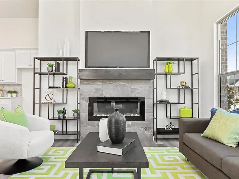 Cozy living room feaurturing beautiful firplace- the perfect place to relax.