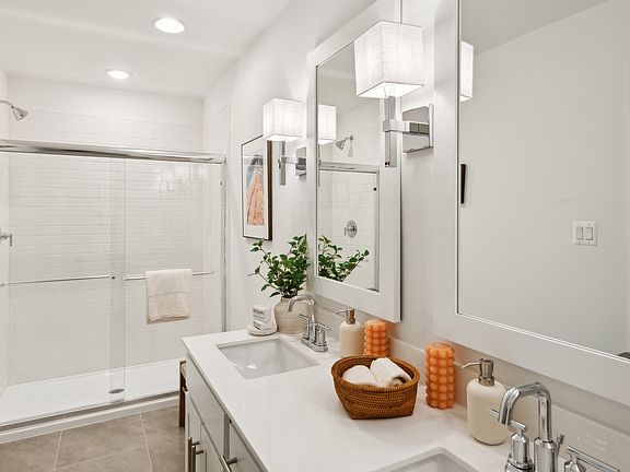 Primary bath with glass-shower enclosure