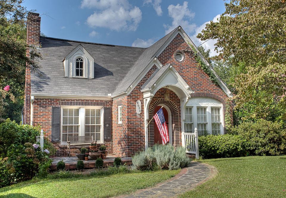 Classic all-brick Tudor bungalow on one of the most secluded streets in Lake Claire