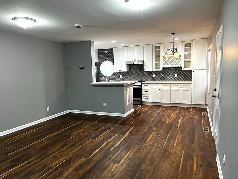 View from living room to dining area and kitchen