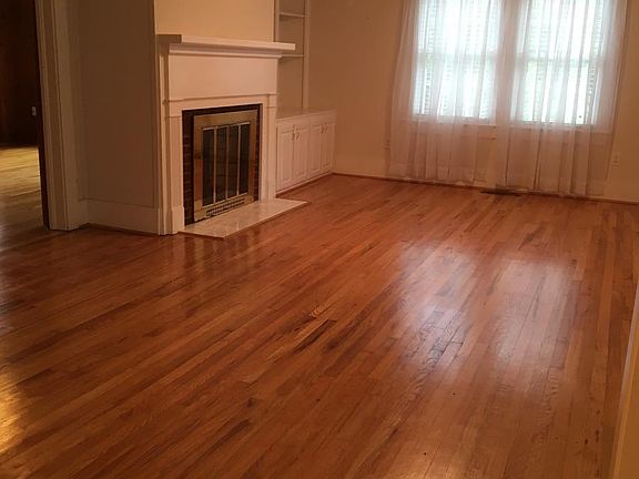 Living room with built in bookshelves 