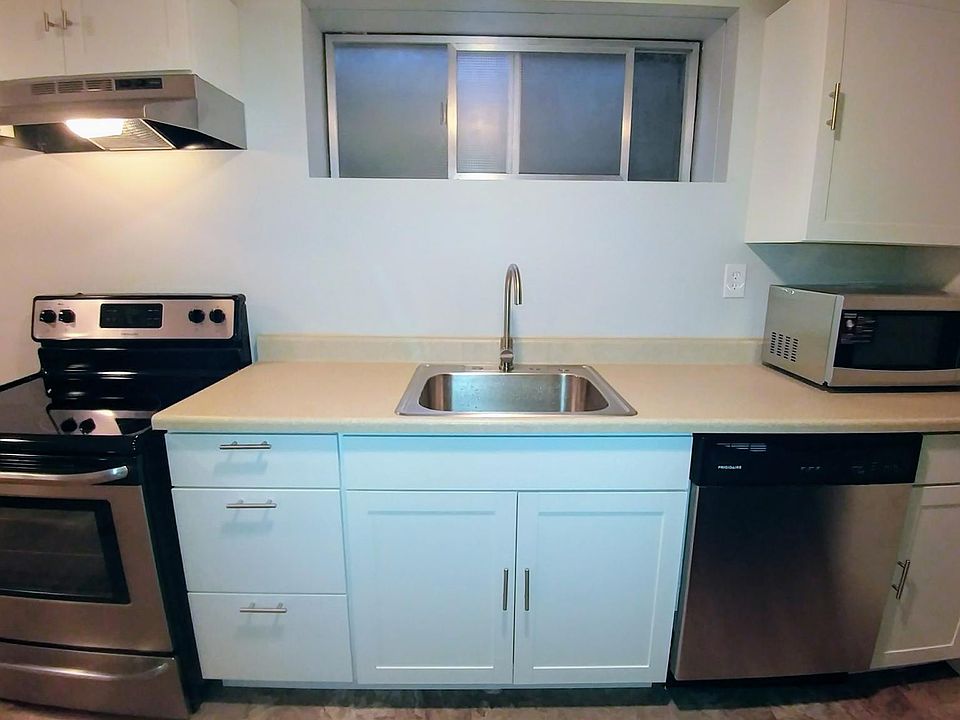 Kitchen w/ stainless steel appliances.