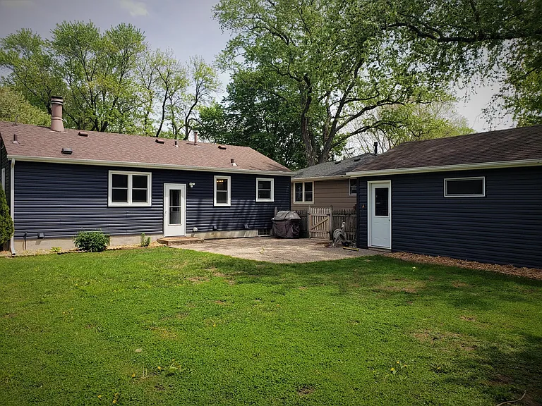 Large patio and backyard fenced in, great for relaxing or entertainment. Oversized garage with lots of storage space