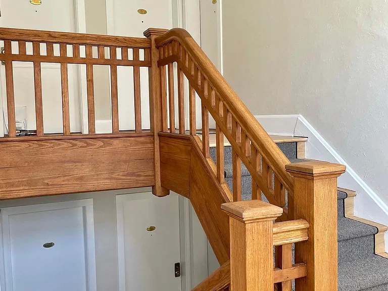 common area hallway. two flights of stairs. unit is directly at top of stairs