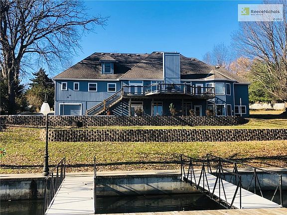 View from the private well dock.  Terraced backyard and seawall.