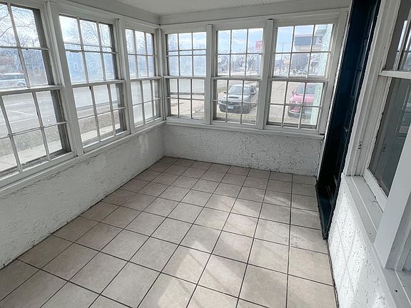 Beautiful and spacious enclosed porch. Plenty of windows to let the sunshine in making a wonderful place to sit and watch the world go by.