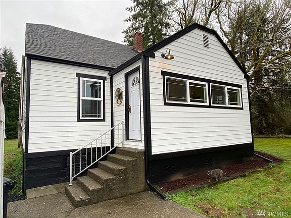 Enter through the spacious mudroom/laundry combo into this home. Kitty not included. 