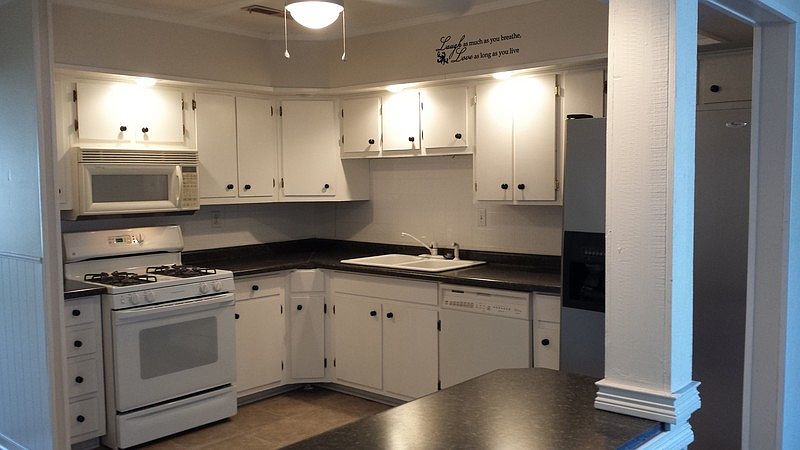 Kitchen
						:
						Cabinets refinished, new countertops, hardware, flooring, paint, appliances, fan