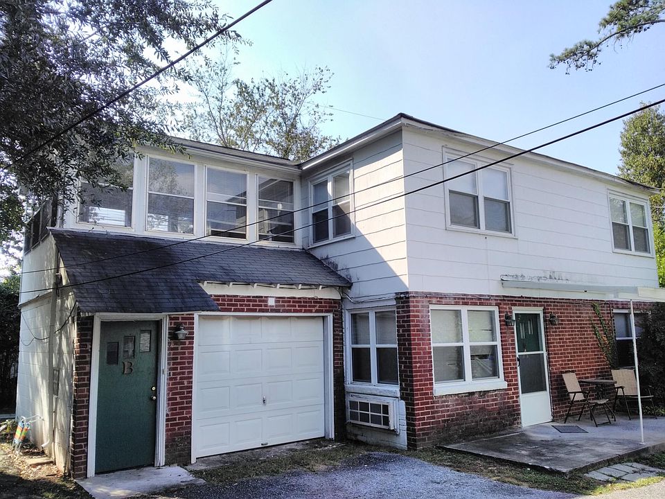 Photo of outside of building top floor is the unit
