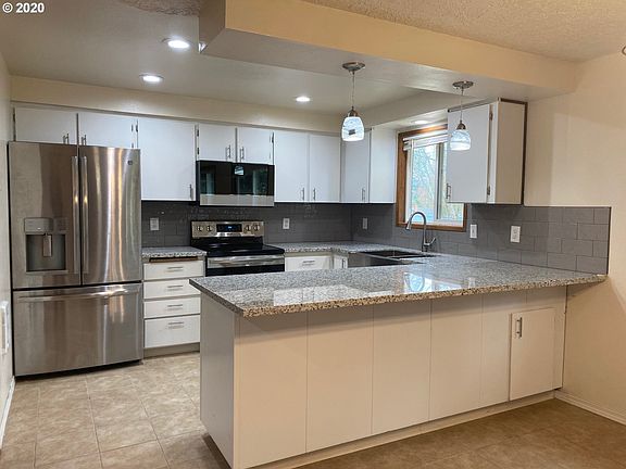 4th image of 9407 NW 20th Ave