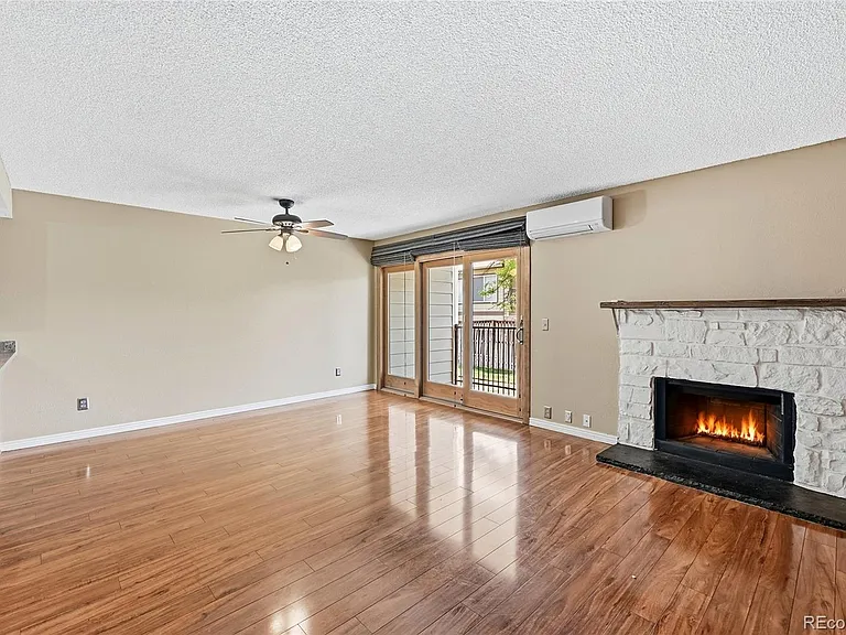 4869 S Dudley St — Photo 4