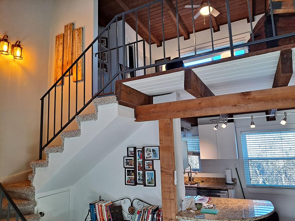 View in livingroom up to Loft/2nd bdroom