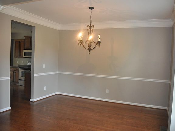 Nice separate dining space at entrance of home with hordwood