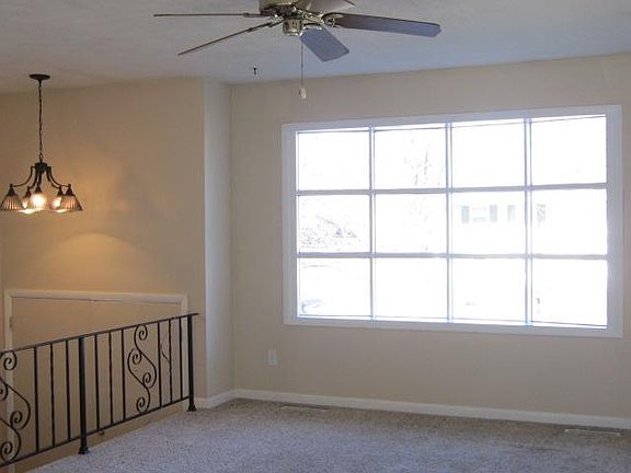 The living room has nice natural light.