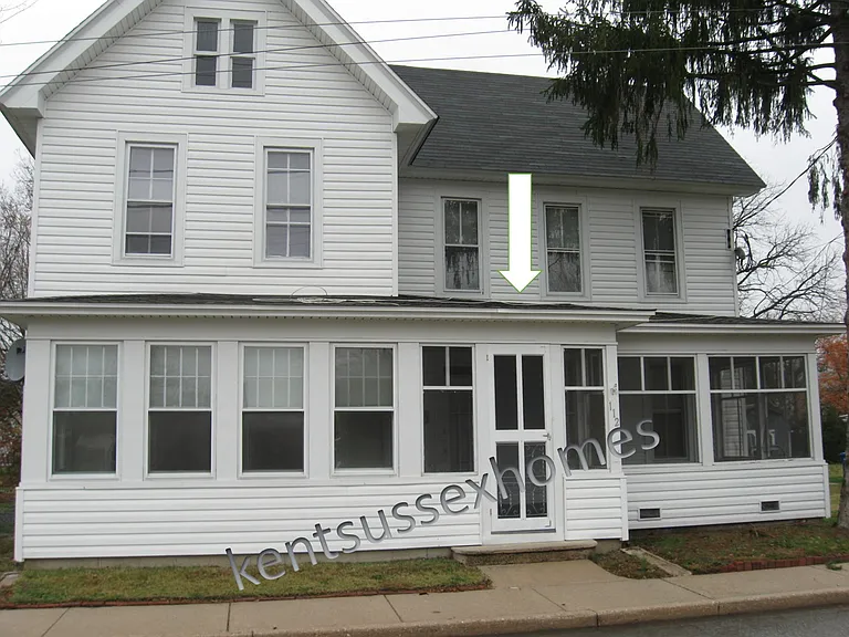 Duplex property; the apartment for rent is on the right side.